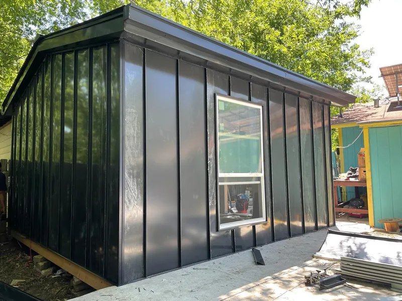 Black standing seam metal wall panels for Roof Inspection in Nogales